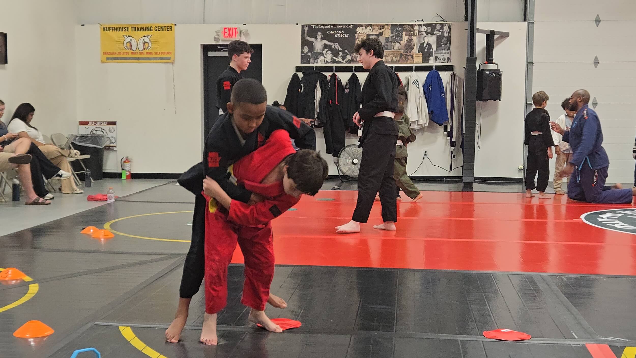 Ruffhouse Jiu-Jitsu students wrestling during youth wrestling class.
